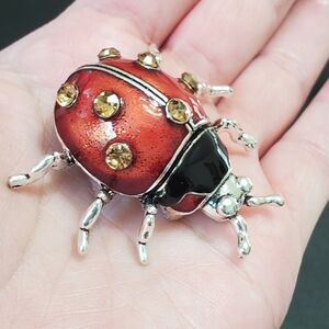 Silver tone red black enamel ladybug brooch